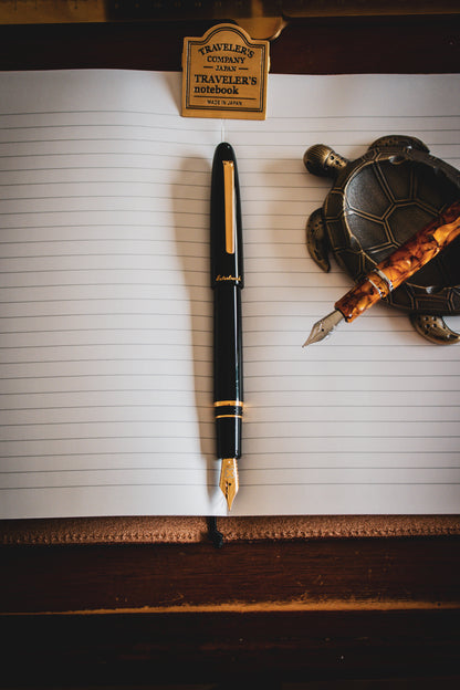 Estie Ebony - Gold Trim