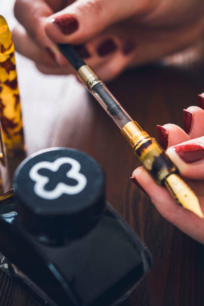 Estie Ebony - Gold Trim